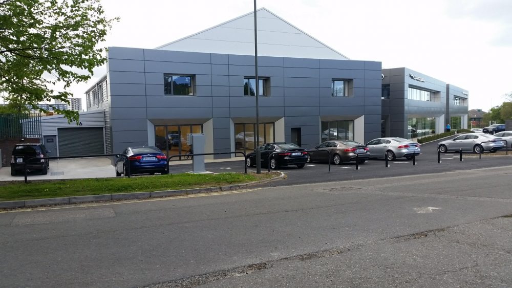 Jaguar Refurbishment full cladding of building Two-storey front and rear extension